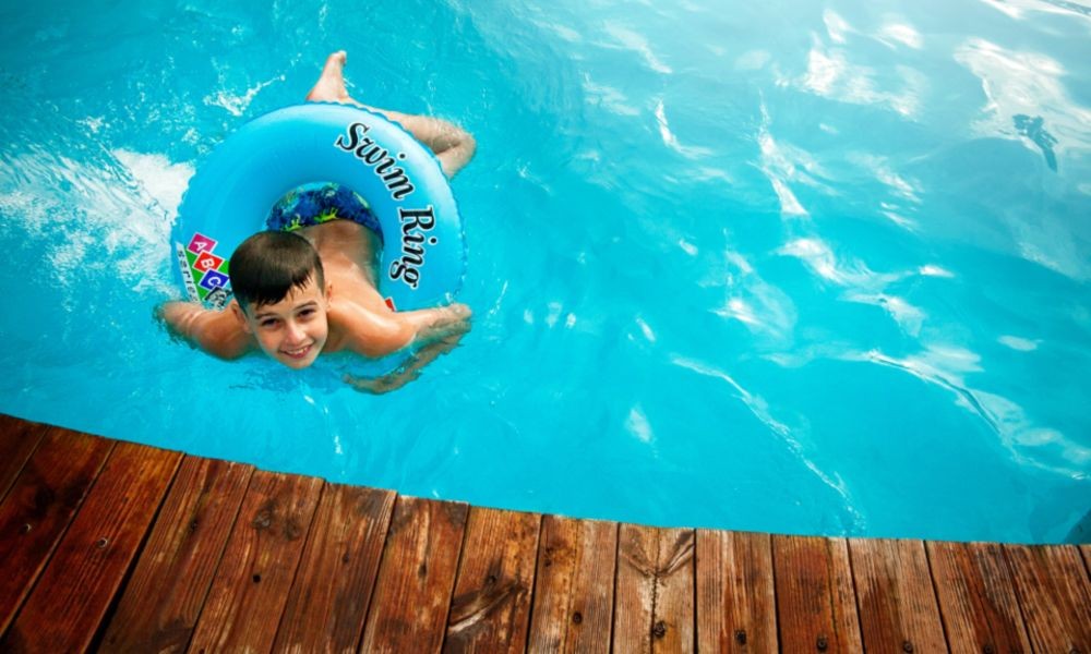 Kid Swimming in a Private Pool - Adriatic Luxury Villas